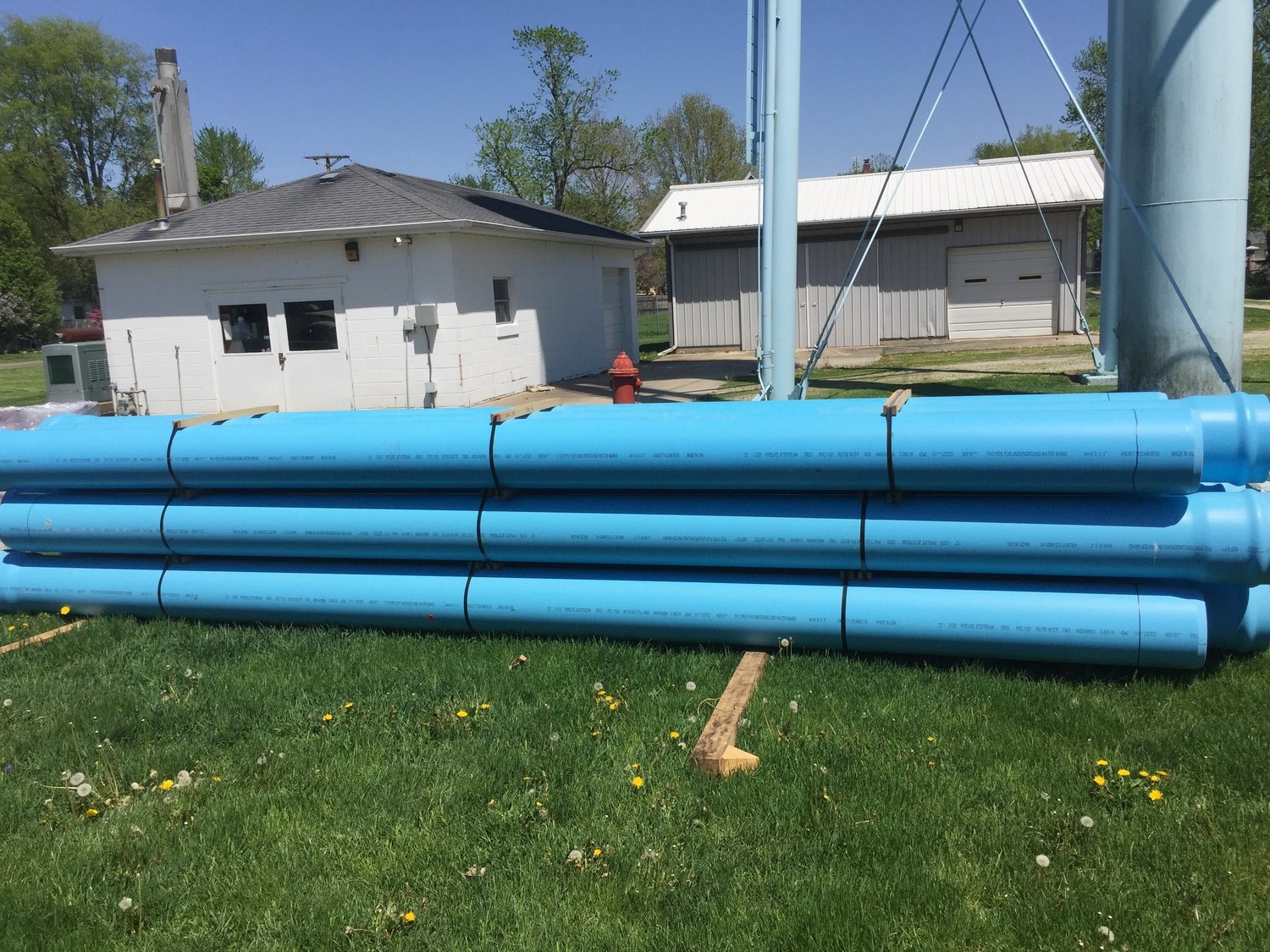 New connector piping awaits installment in the Village of Sadorus, Illinois. Part of a water system rehabilitation project connecting Sadorus to the safer, cleaner drinking water of nearby Champaign, Illinois.