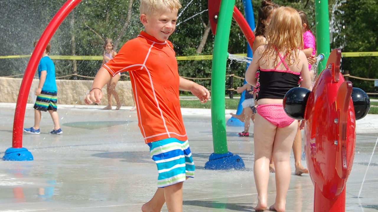 New splash pad and playground at Sauk City Riverfront Park in Sauk City, Wisconsin - design and project by MSA Professional Services.