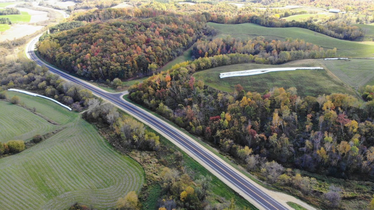 Aerial view of Wisconsin state highway 93, reconstructed with cold in-place recycled asphalt and boosting safety and pedestrian access in the community of Eleva.