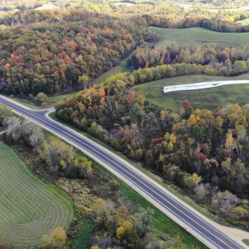 Aerial view of Wisconsin state highway 93, reconstructed with cold in-place recycled asphalt and boosting safety and pedestrian access in the community of Eleva.