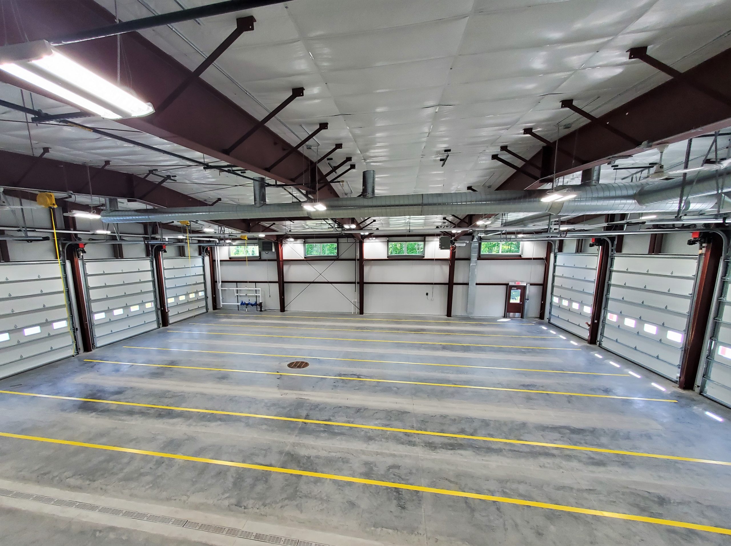 The inside of the new volunteer fire station in White Lake, Wisconsin, has room for nine trucks and large, drive-through bays.