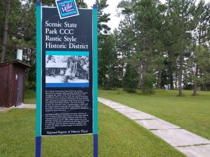 Image of a sign at Scenic State Park in Minnesota about the Civilian Conservation Corps camp on premises