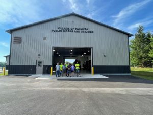 Image of people at an open house celebrating the newly completed wastewater treatment facility and public works garage in Palmyra, Wisconsin. 