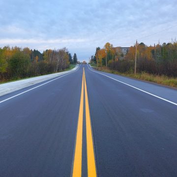 Finished photograph of newly resurfaced Ugstad Road in the City of Hermantown Minnesota.