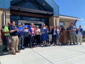 Photo showing a ribbon-cutting ceremony for a new aquatic center in the City of Evansville, Wisconsin